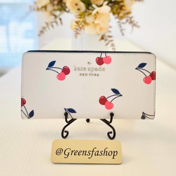 kate spade Handbags - Kate Spade staci large slim bifold wallet dancing cherrie new